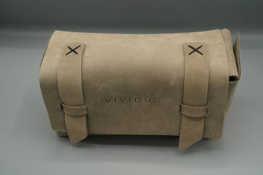 Leather Dopp Kit Bag roll-up bag with 'VIVIDUS' branding on a gray background