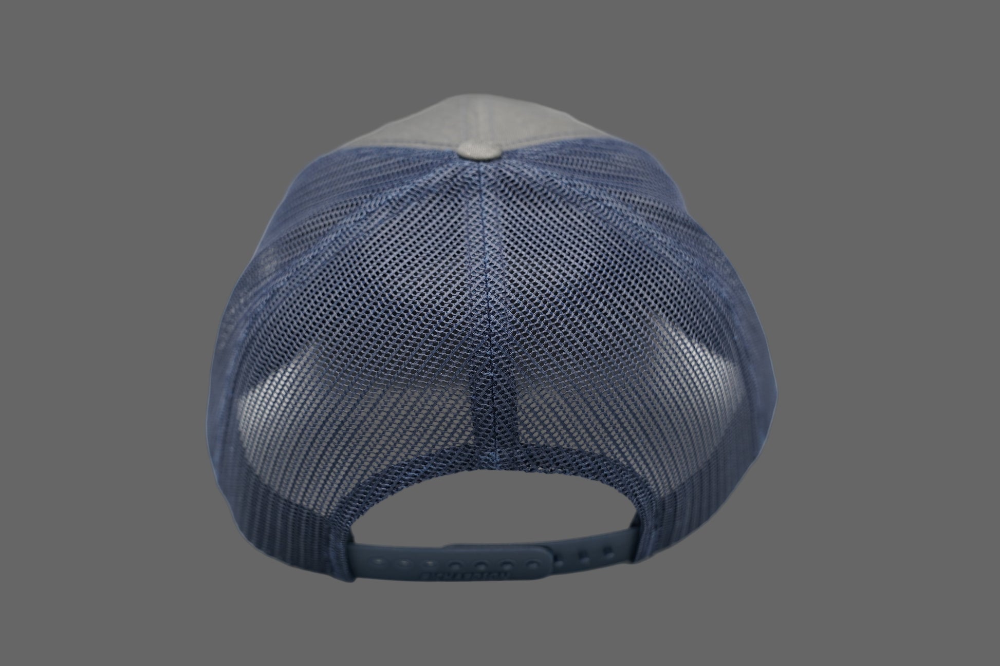Blue mesh cap on a gray background