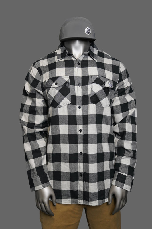 Black and white checkered shirt  against a gray background