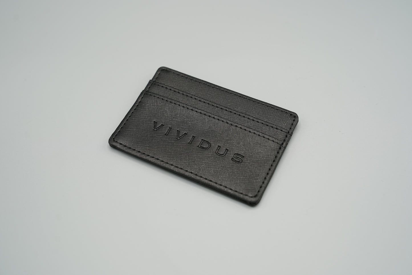 Elegant genuine diamond-textured leather RFID VIVIDUS debossed card holder