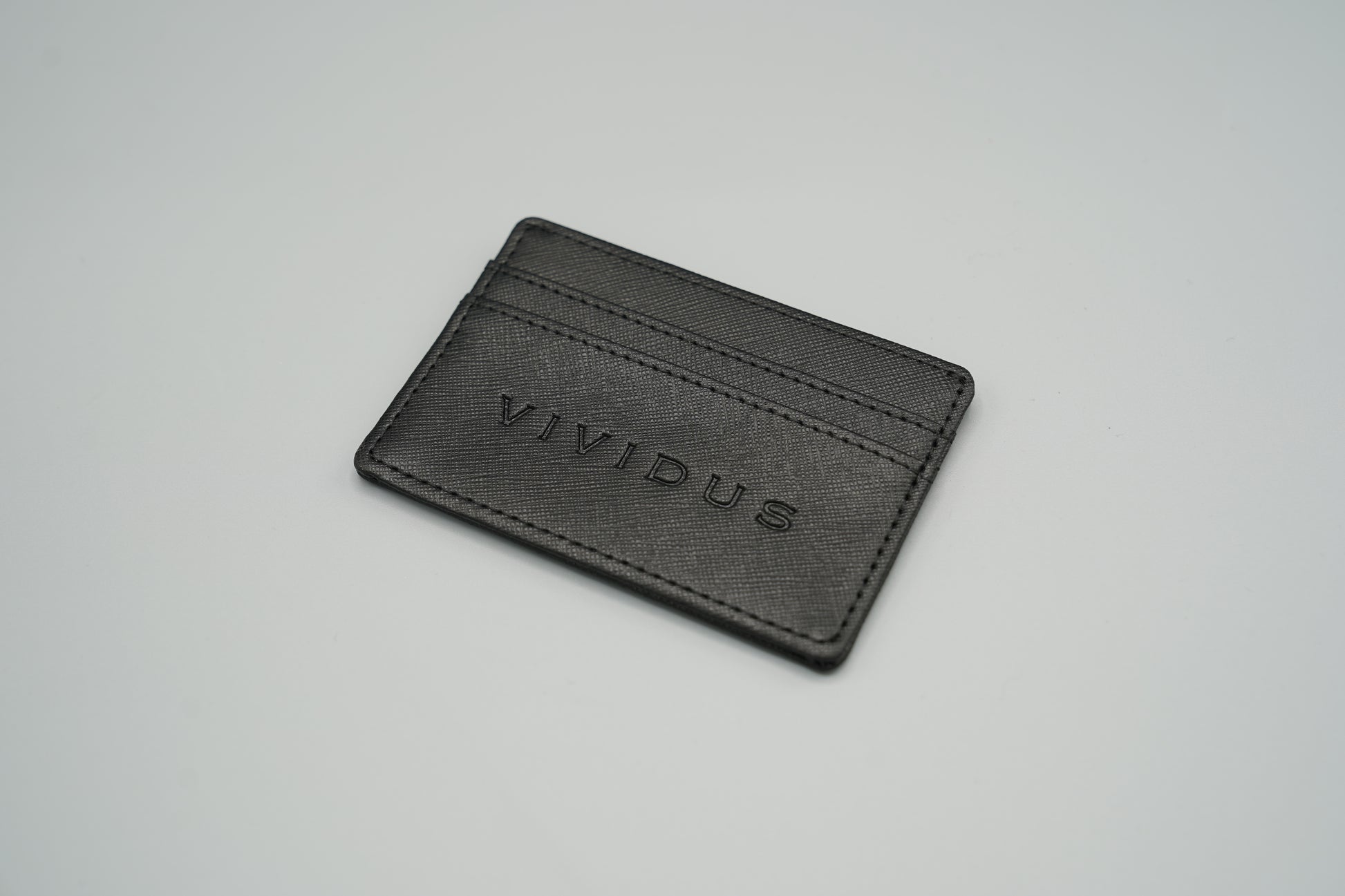 Elegant genuine diamond-textured leather RFID VIVIDUS debossed card holder