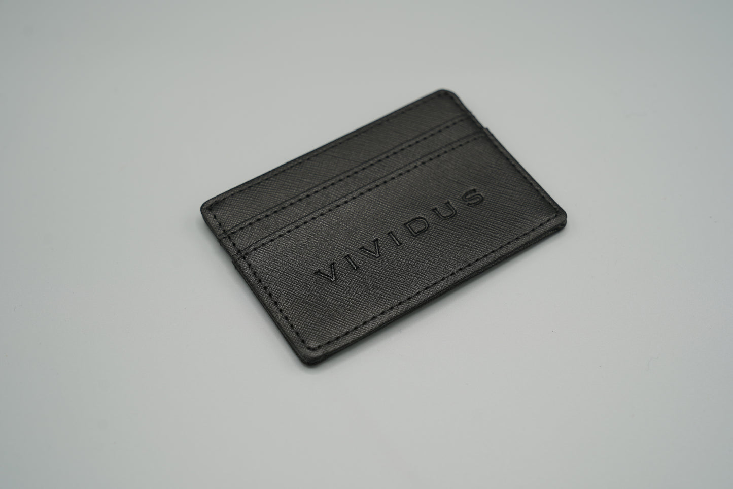 Elegant genuine diamond-textured leather RFID VIVIDUS debossed card holder