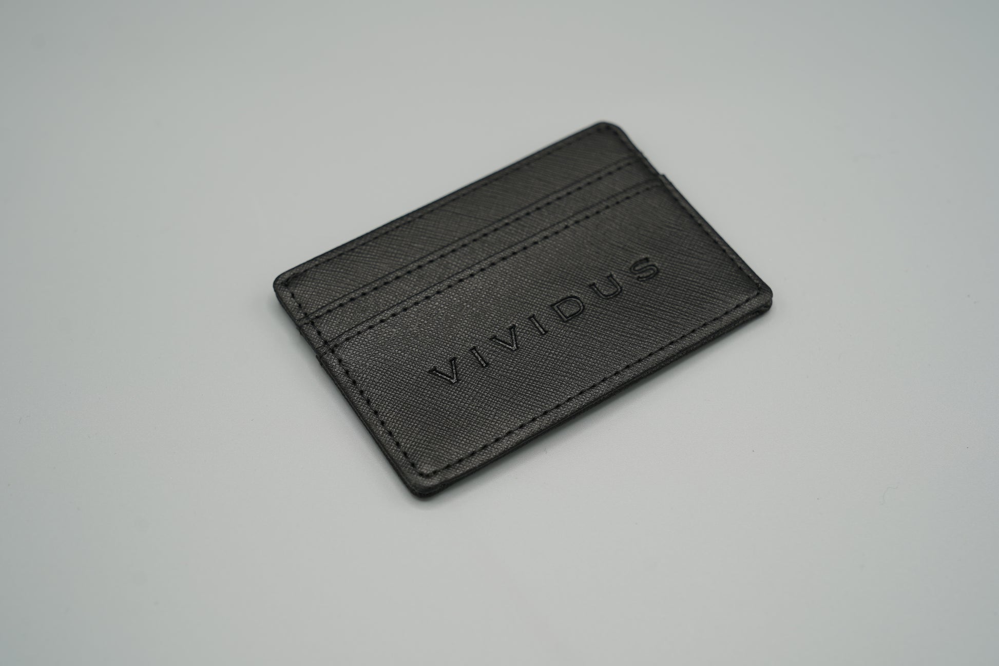 Elegant genuine diamond-textured leather RFID VIVIDUS debossed card holder