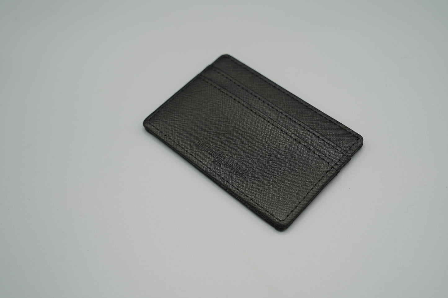Elegant genuine diamond-textured leather RFID VIVIDUS debossed card holder