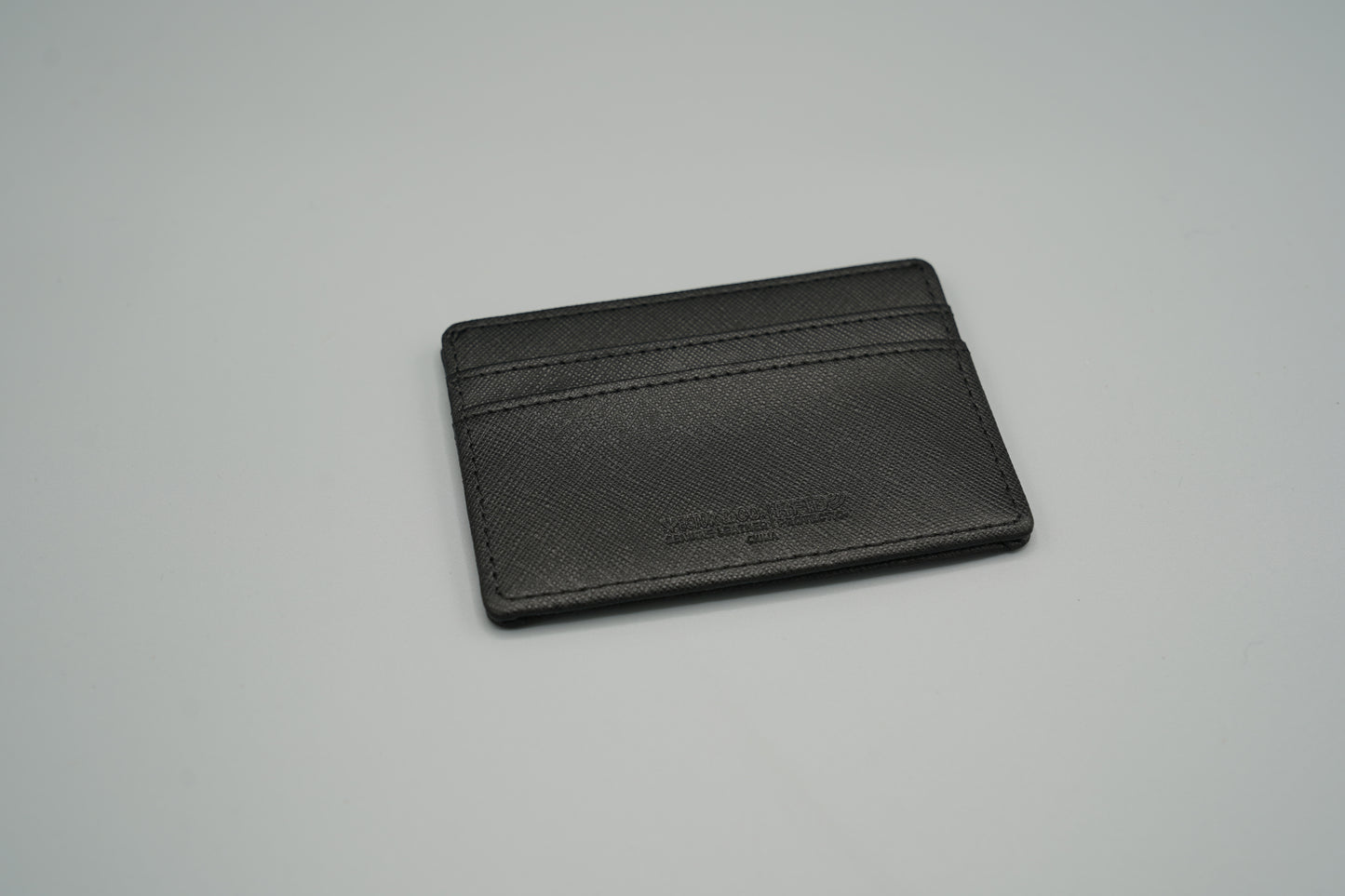 Elegant genuine diamond-textured leather RFID VIVIDUS debossed card holder