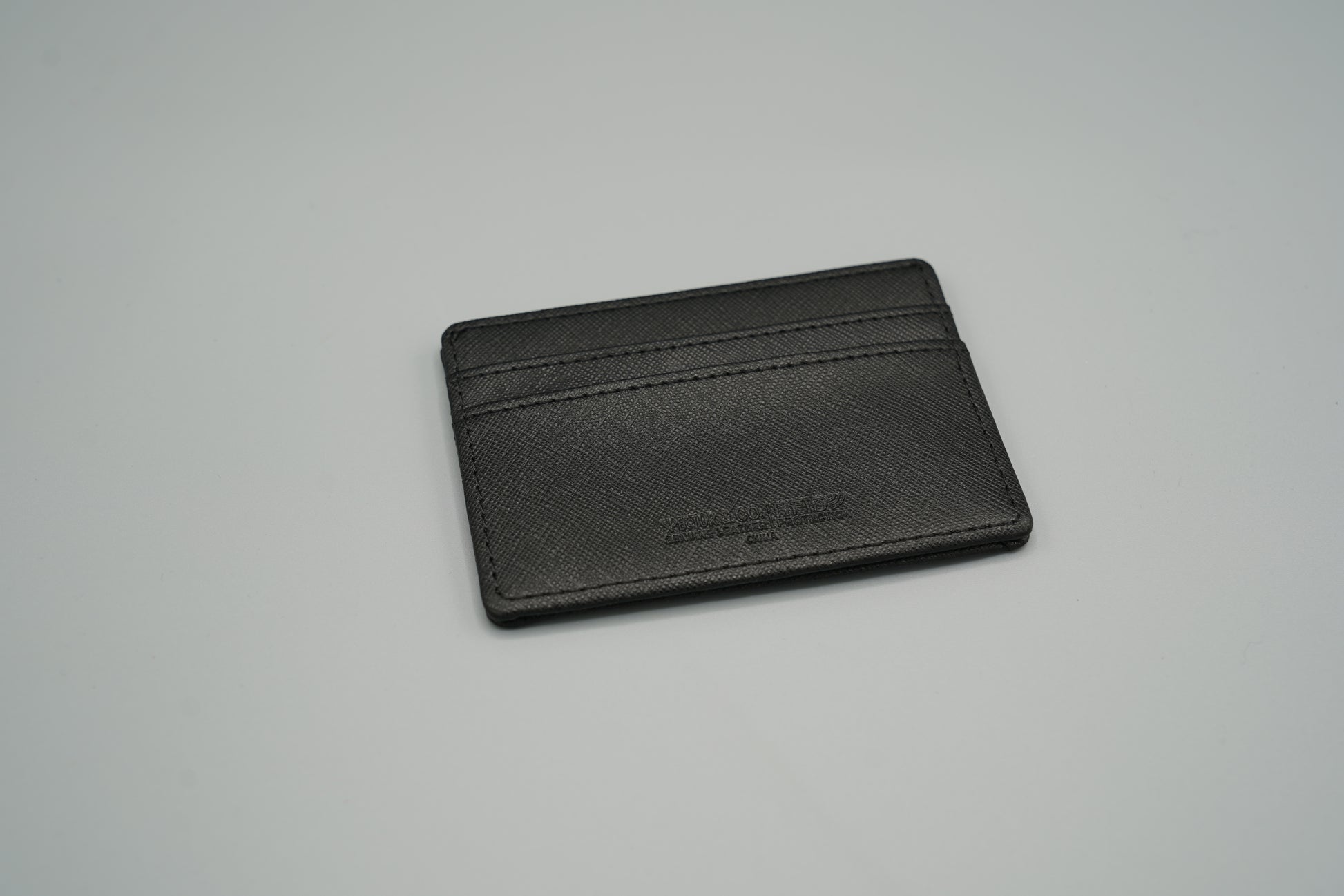 Elegant genuine diamond-textured leather RFID VIVIDUS debossed card holder