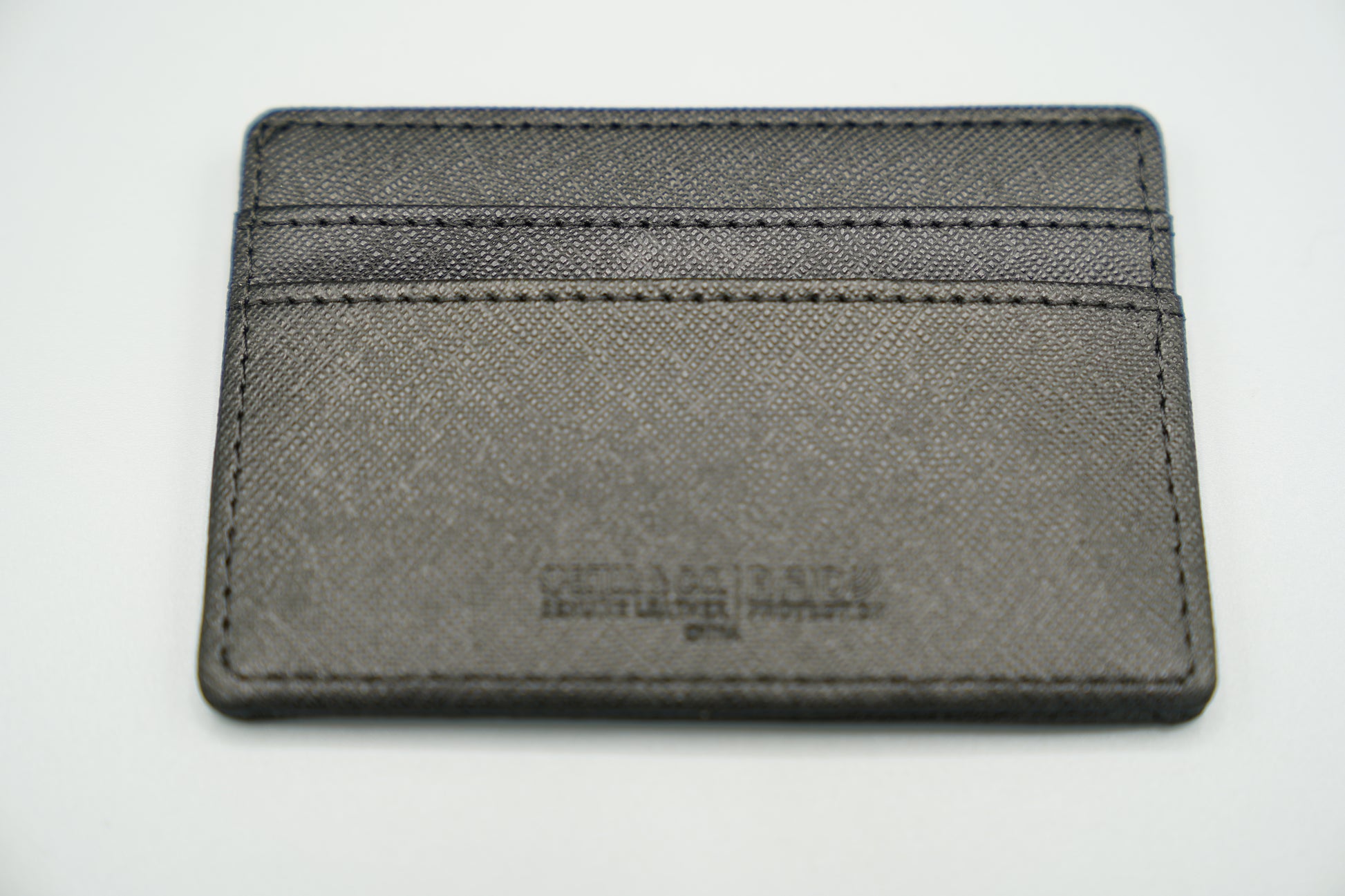 Elegant genuine diamond-textured leather RFID VIVIDUS debossed card holder