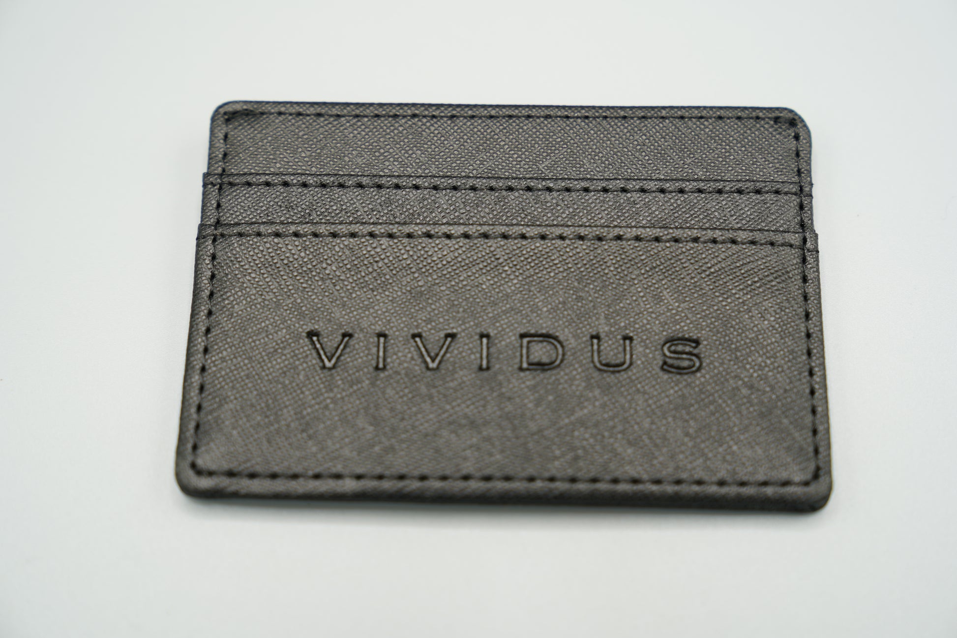 Elegant genuine diamond-textured leather RFID VIVIDUS debossed card holder